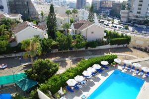 an aerial view of a resort with a swimming pool at Polyxeni Hotel Apartments in Limassol