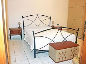 Ein Bett oder Betten in einem Zimmer der Unterkunft Victoria's Apartment