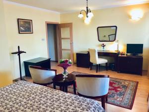 TV a/nebo společenská místnost v ubytování HOTEL SAN