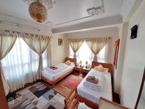 Llit o llits en una habitació de Shakya House