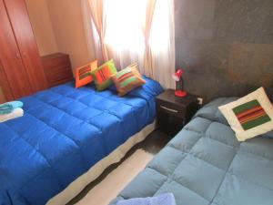 Letto o letti in una camera di Hostal Desert