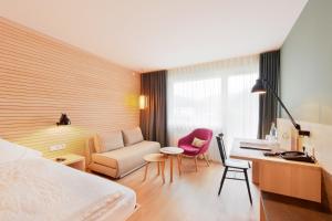 Letto o letti in una camera di Hotel Weisses Kreuz