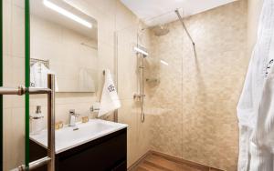 Phòng tắm tại Apartmánový Hotel HREBIENOK RESORT