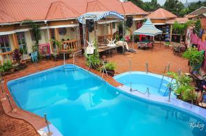an overhead view of a large blue swimming pool at Dreamz Recreation Center in Jinja