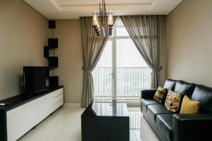 Χώρος καθιστικού στο Highest Value 1BR Apartment at Ciputra International By Travelio