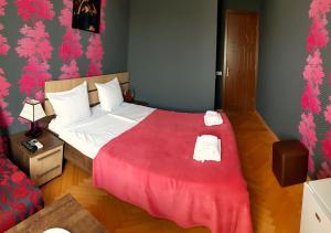 Кровать или кровати в номере Bonus Hotel