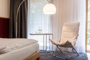 Ein Bett oder Betten in einem Zimmer der Unterkunft Ringhotel Schorfheide, Tagungszentrum der Wirtschaft