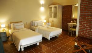 Postel nebo postele na pokoji v ubytování Olinia Airport Hotel + 37 fotografií