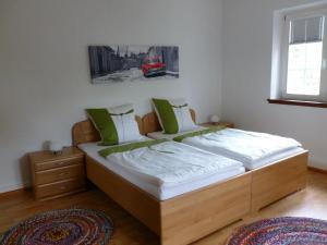 Postel nebo postele na pokoji v ubytování Altes Vogtshaus