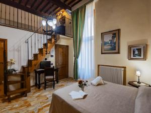 Posteľ alebo postele v izbe v ubytovaní B&B Siena In Centro - Diffuso