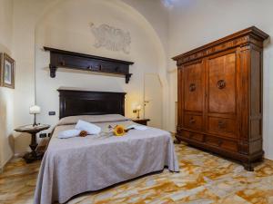 Posteľ alebo postele v izbe v ubytovaní B&B Siena In Centro - Diffuso