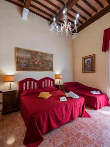Posteľ alebo postele v izbe v ubytovaní B&B Siena In Centro - Diffuso