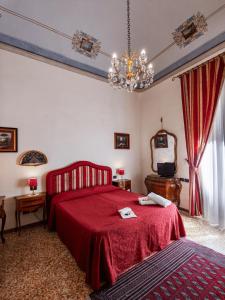 Posteľ alebo postele v izbe v ubytovaní B&B Siena In Centro - Diffuso