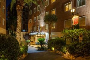 a building with a walkway in front of a building at Bonanova Park in Barcelona