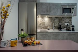 Kuchyň nebo kuchyňský kout v ubytování Apartamentos Turísticos Moret11-1A