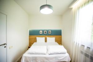 Voodi või voodid majutusasutuse Tezh Ler Resort toas