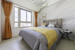Ένα ή περισσότερα κρεβάτια σε δωμάτιο στο Xi'an Lianhu.Beidajie International
