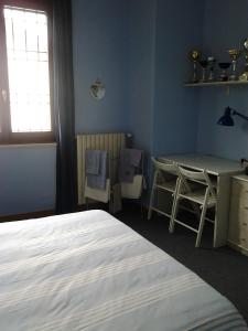 A bed or beds in a room at Le Magnolie B&B