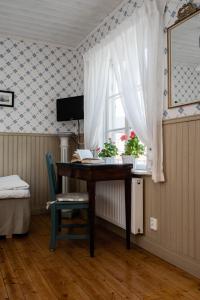 TV a/nebo společenská místnost v ubytování Enångers Bed and Breakfast