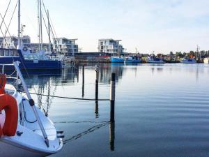 a boat is docked in a marina with other boats at 6 person holiday home in Wendtorf in Wendtorf