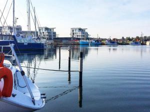 een boot is aangemeerd in een jachthaven met andere boten bij 6 person holiday home in Wendtorf in Wendtorf