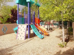 a playground with a slide in a park at Sedona Springs Resort, a VRI resort in Sedona
