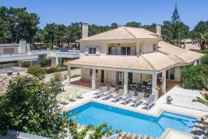 Bazén v ubytování Villa Amendoa nebo v jeho okolí