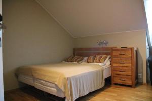 Myrkdalen Resort- studio apartment tesisinde bir odada yatak veya yataklar