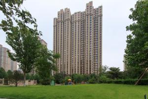 a large building with a park in front of it at Baoding Lianchi·North China Electric Power University· in Baoding