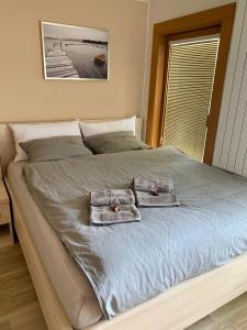 Postel nebo postele na pokoji v ubytování Apartmán MH