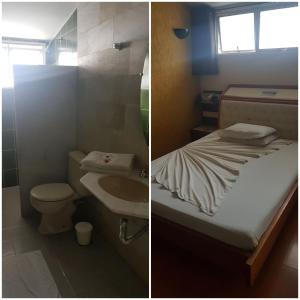 a bathroom with a bed and a toilet and a sink at Sleep Suites in Belo Horizonte