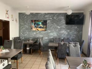 Khu vực ghế ngồi tại Gasthof Knezevic