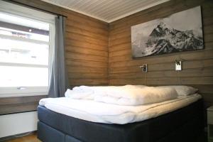 מיטה או מיטות בחדר ב-Myrkdalen Resort Nedre Byggardslii apartment