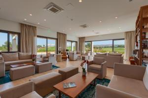 A seating area at Aphrodite Hills Golf & Spa Resort Residences - Junior Villas
