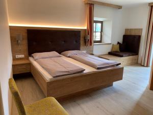 Postel nebo postele na pokoji v ubytování Hotel Sonnenheim