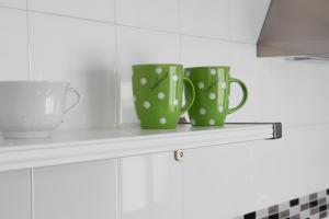 Příslušenství pro přípravu čaje a kávy v ubytování Apartamento Centro Sanlucar