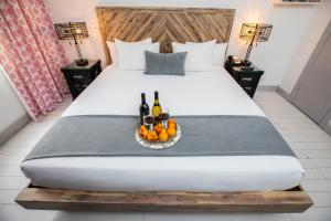Postel nebo postele na pokoji v ubytování Whitelaw Hotel
