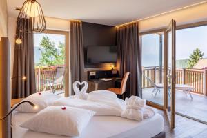 Postel nebo postele na pokoji v ubytování Hotel Sonnenheim + 33 fotografií
