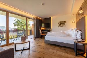 Postel nebo postele na pokoji v ubytování Hotel Sonnenheim