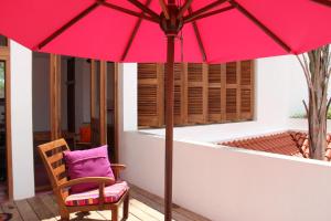 Patio nebo venkovní prostory v ubytování UTMT - Underneath The Mango Tree Spa & Beach Resort