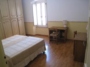 Posteľ alebo postele v izbe v ubytovaní Casa Mariotti