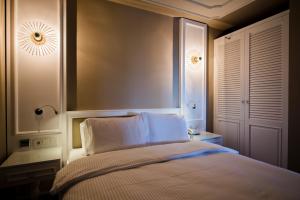 Ein Bett oder Betten in einem Zimmer der Unterkunft Samira Exclusive Hotel & Apartments