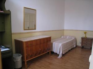 Posteľ alebo postele v izbe v ubytovaní Casa Mariotti