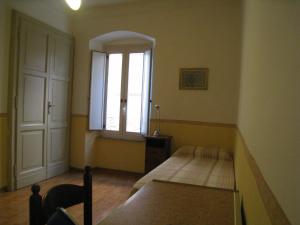 Posteľ alebo postele v izbe v ubytovaní Casa Mariotti