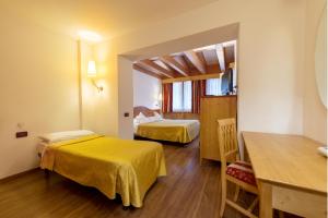 Afbeelding uit fotogalerij van Hotel Alpino Al Cavalletto in Canazei