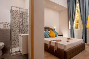 Posteľ alebo postele v izbe v ubytovaní The Shell Rome Suite