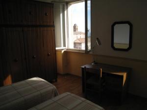 Posteľ alebo postele v izbe v ubytovaní Casa Mariotti