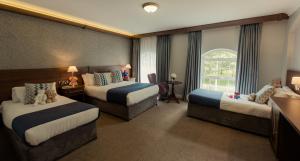 Postelja oz. postelje v sobi nastanitve Woodford Dolmen Hotel Carlow
