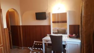 Kuchyň nebo kuchyňský kout v ubytování Hotel Olympic