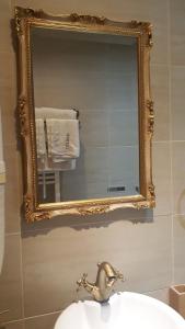 Koupelna v ubytování Hotel Olympic